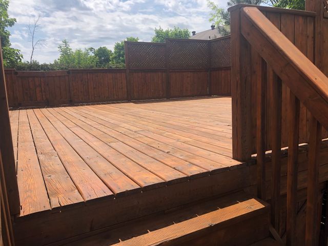 Deck re-stained to a rich wooden finish